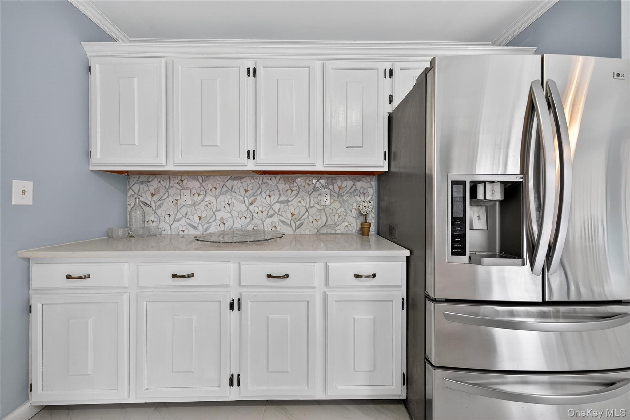 120 Pine Tree Road Monroe, NY 10950 - Photo 14 of 50 a kitchen with stainless steel appliances granite countertop a refrigerator a stove and white cabinets