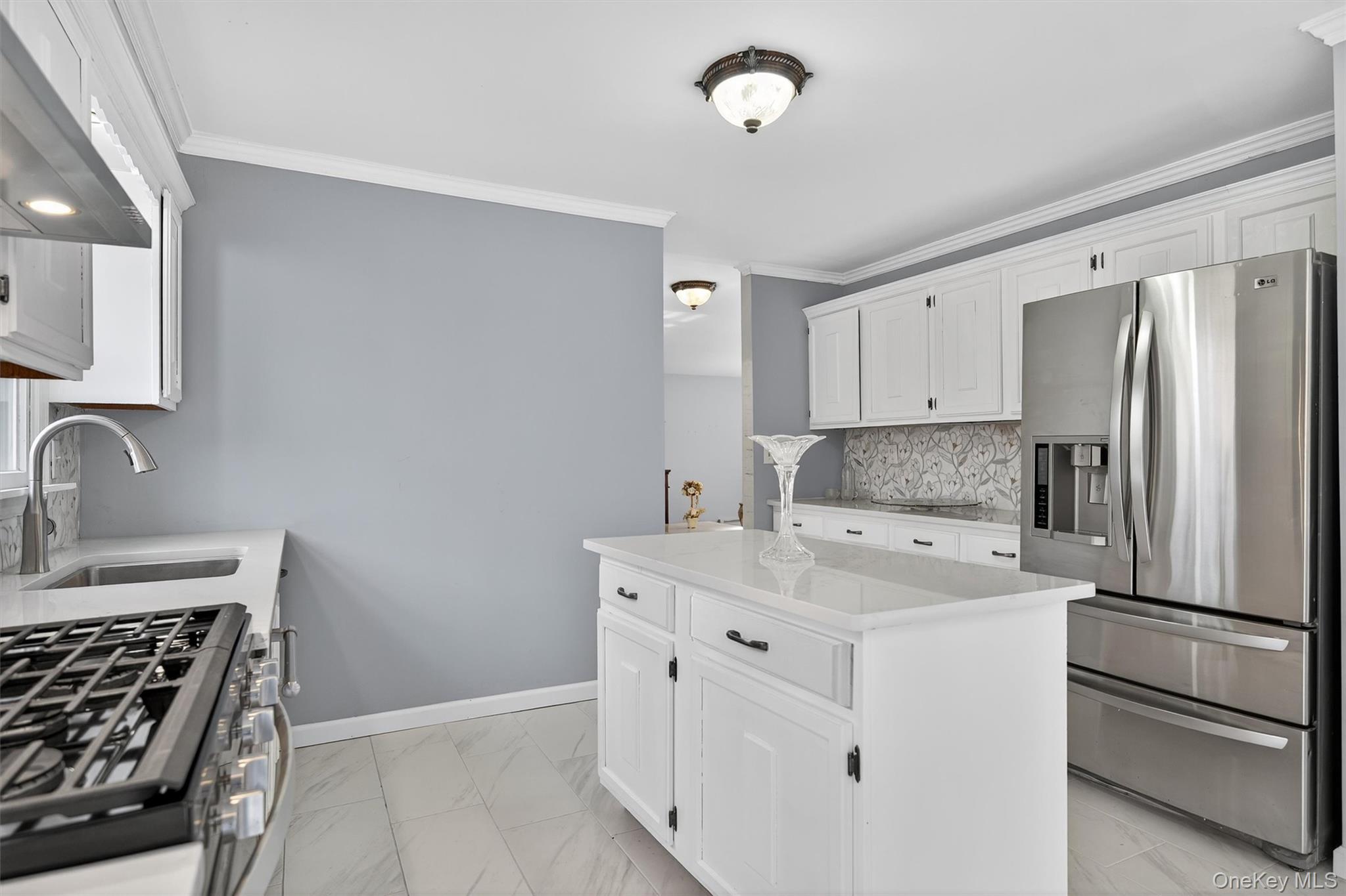 120 Pine Tree Road Monroe, NY 10950 - Photo 16 of 50 a kitchen with a stove sink and refrigerator