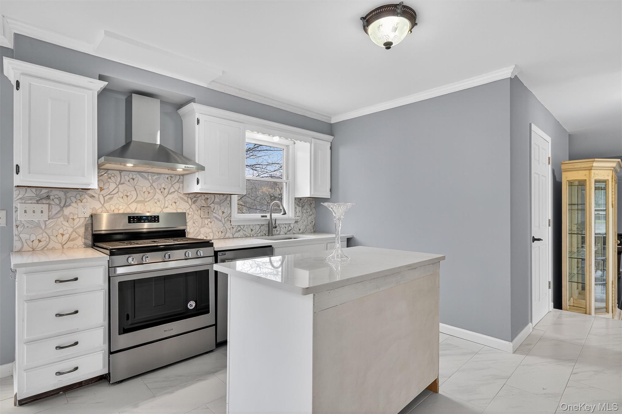 120 Pine Tree Road Monroe, NY 10950 - Photo 17 of 50 a kitchen with cabinets stainless steel appliances and a window