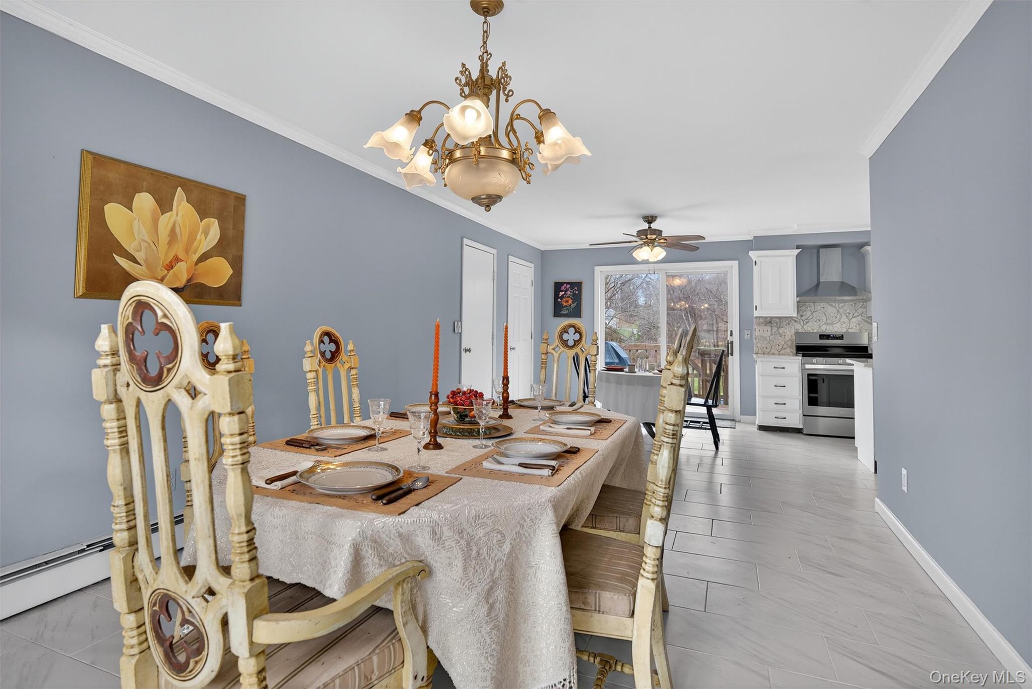 120 Pine Tree Road Monroe, NY 10950 - Photo 19 of 50 a view of a dining room with furniture and chandelier