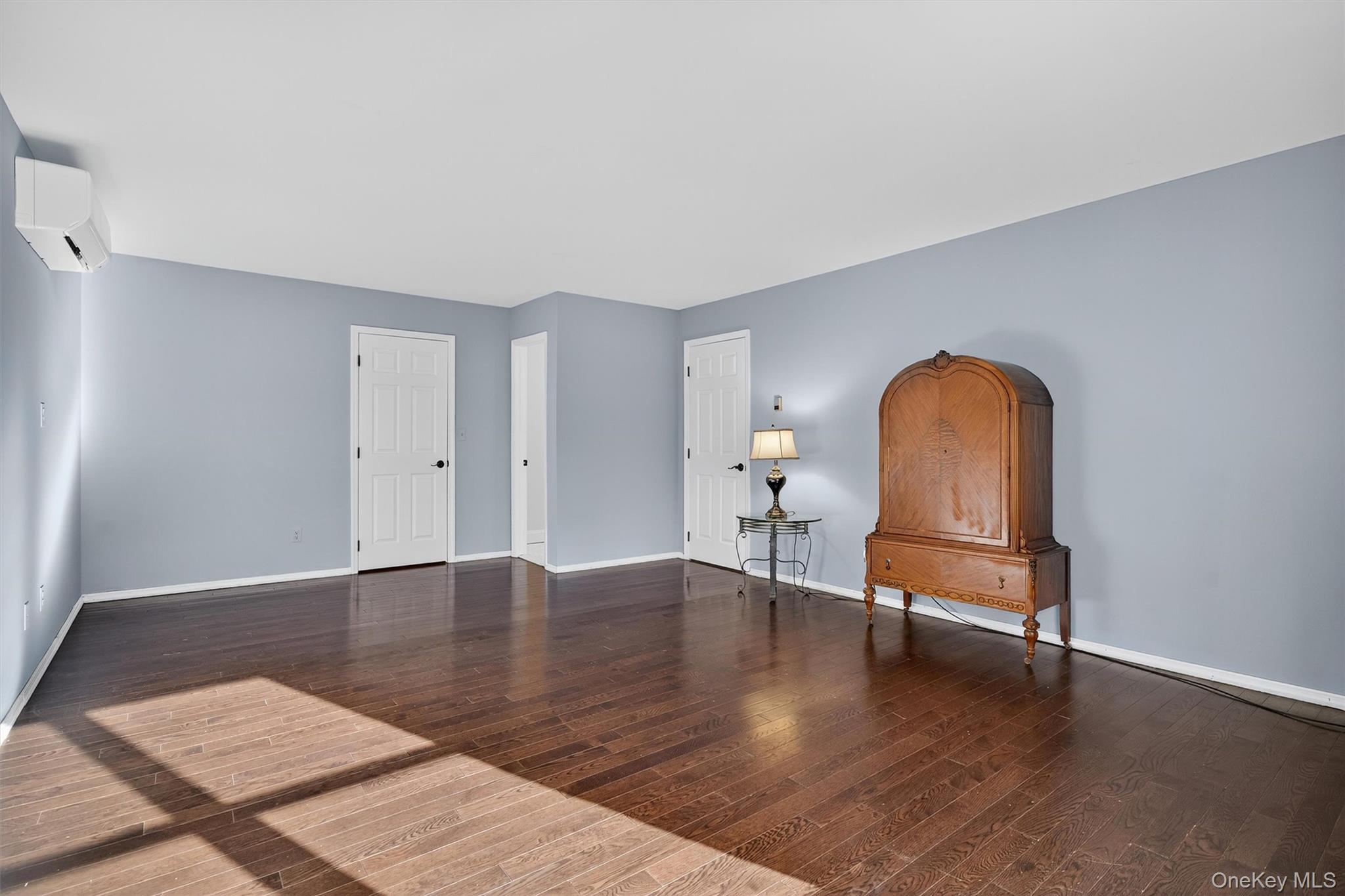 120 Pine Tree Road Monroe, NY 10950 - Photo 23 of 50 a view of a room with wooden floor table and windows