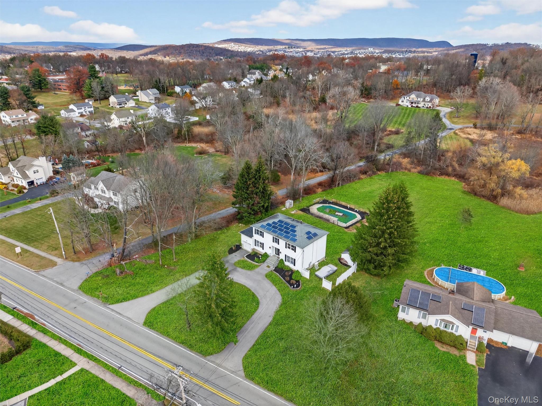 120 Pine Tree Road Monroe, NY 10950 - Photo 35 of 50 an aerial view of a golf course with parking space
