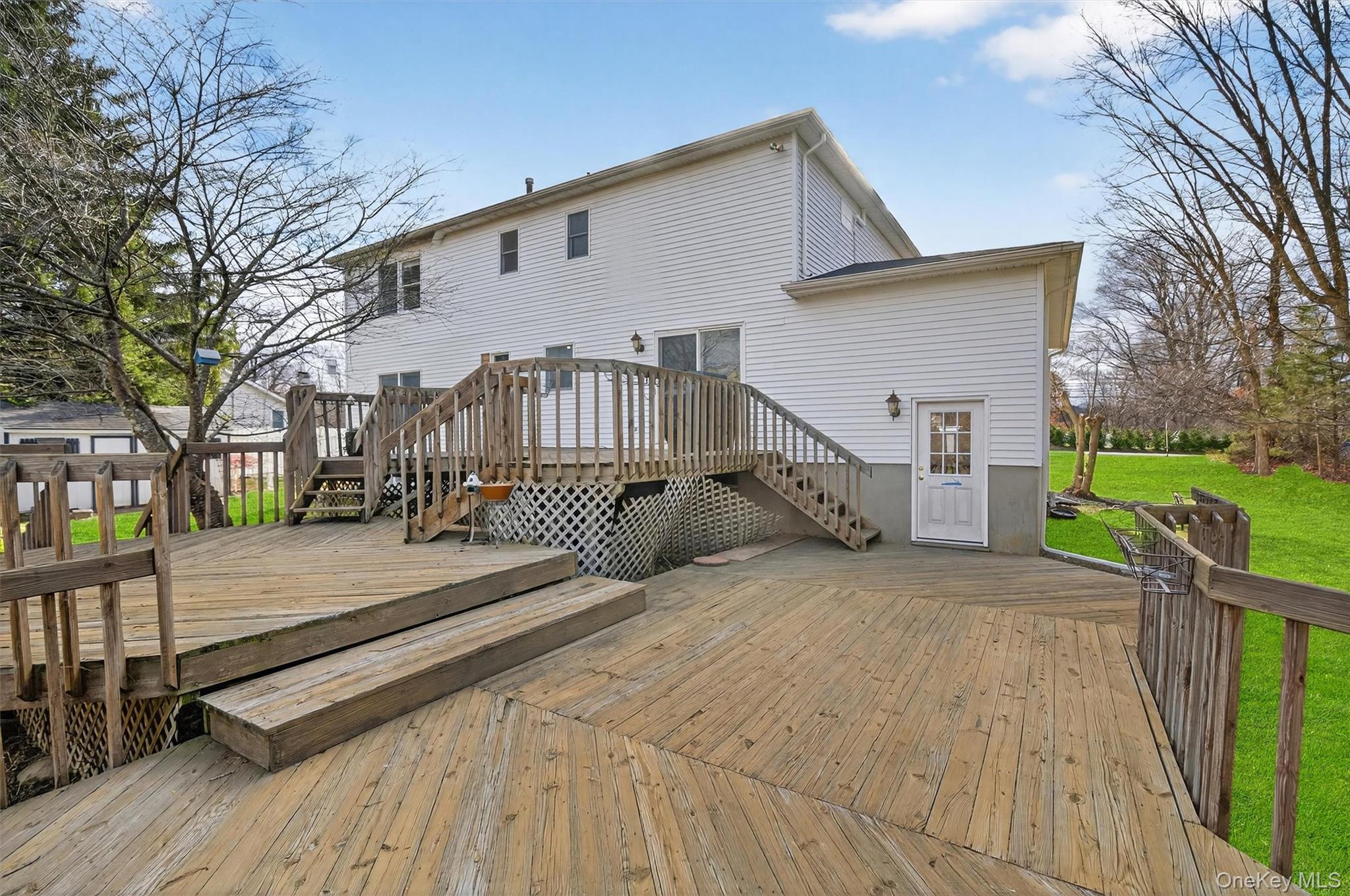 120 Pine Tree Road Monroe, NY 10950 - Photo 37 of 50 a view of a house with wooden floor next to a yard