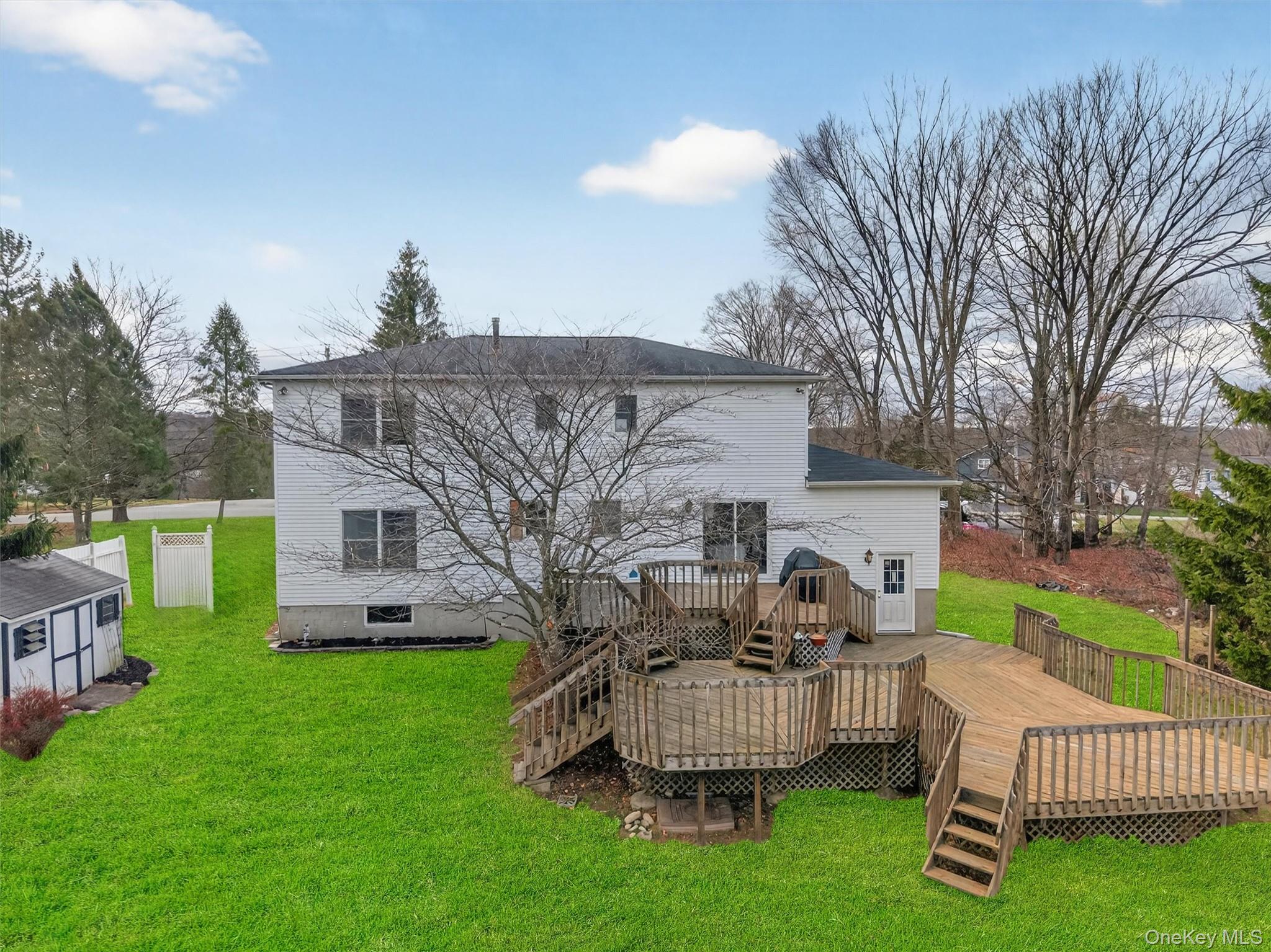 120 Pine Tree Road Monroe, NY 10950 - Photo 38 of 50 a view of a house with backyard and porch