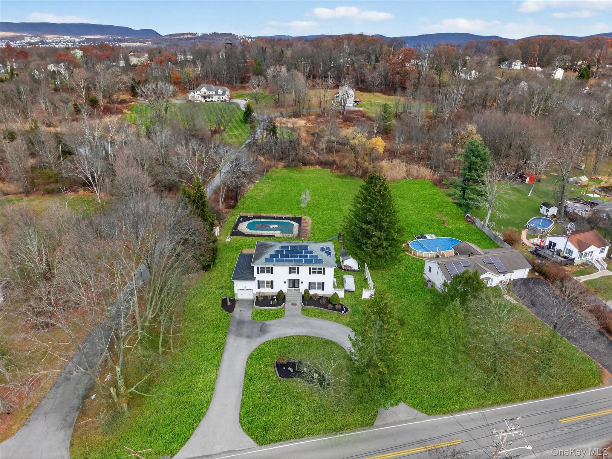 120 Pine Tree Road Monroe, NY 10950 - Photo 4 of 50 an aerial view of a golf course with parking space