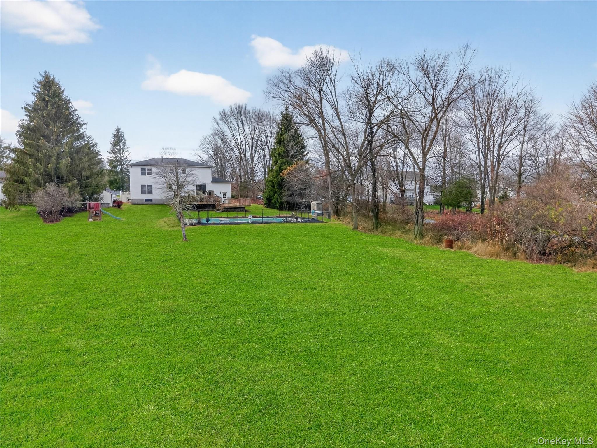 120 Pine Tree Road Monroe, NY 10950 - Photo 41 of 50 a view of a garden and trees