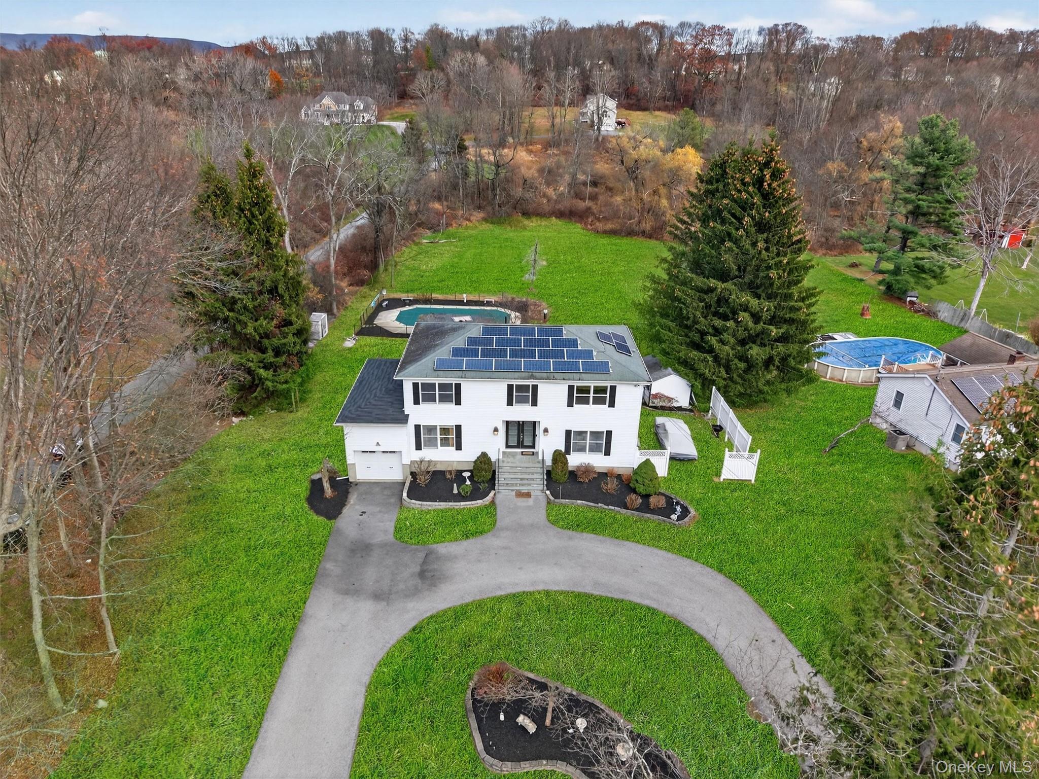 120 Pine Tree Road Monroe, NY 10950 - Photo 5 of 50 an aerial view of a house with garden