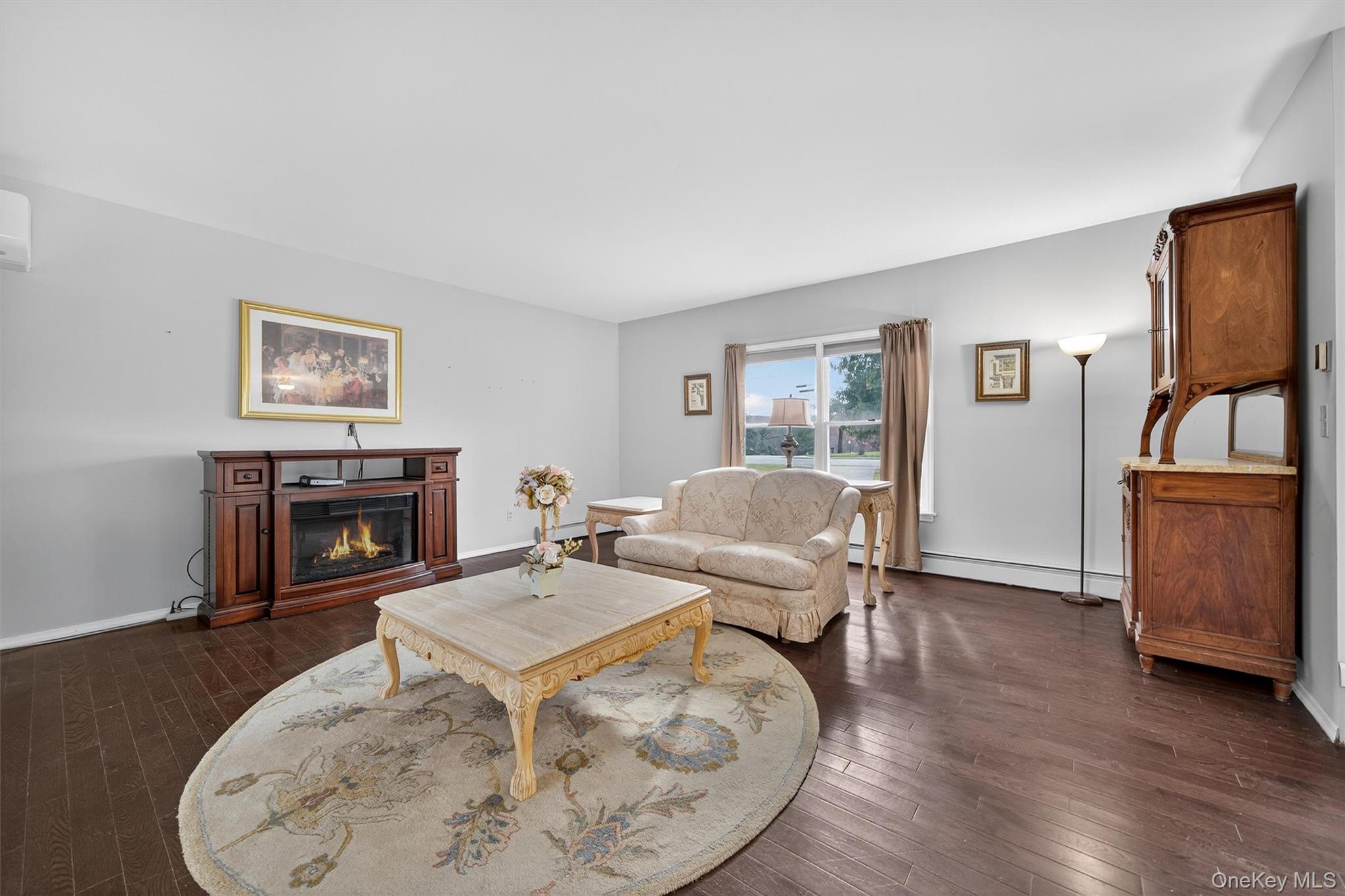 120 Pine Tree Road Monroe, NY 10950 - Photo 9 of 50 a living room with furniture and a fireplace