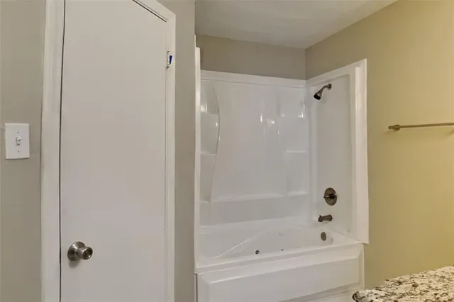 a bathroom with a bathtub