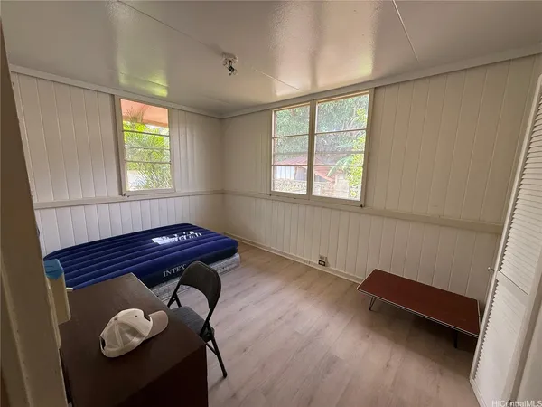 a room with furniture and a window