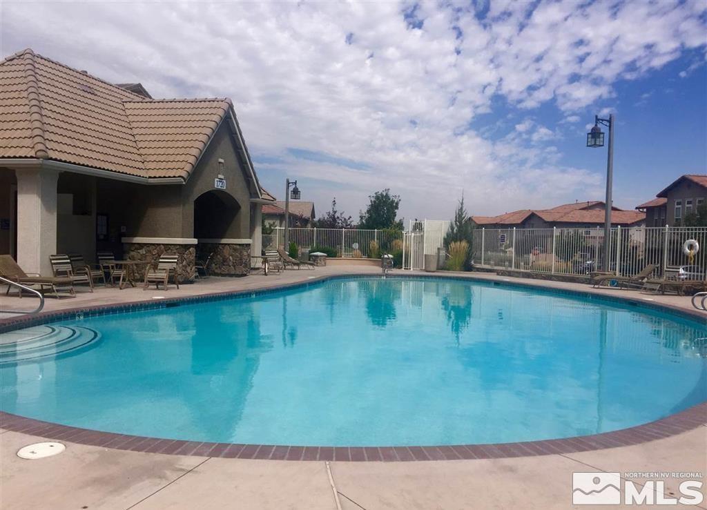1872 Wind Ranch Road, Unit A Reno, NV 89521 - Photo 32 of 33 a view of a house with swimming pool