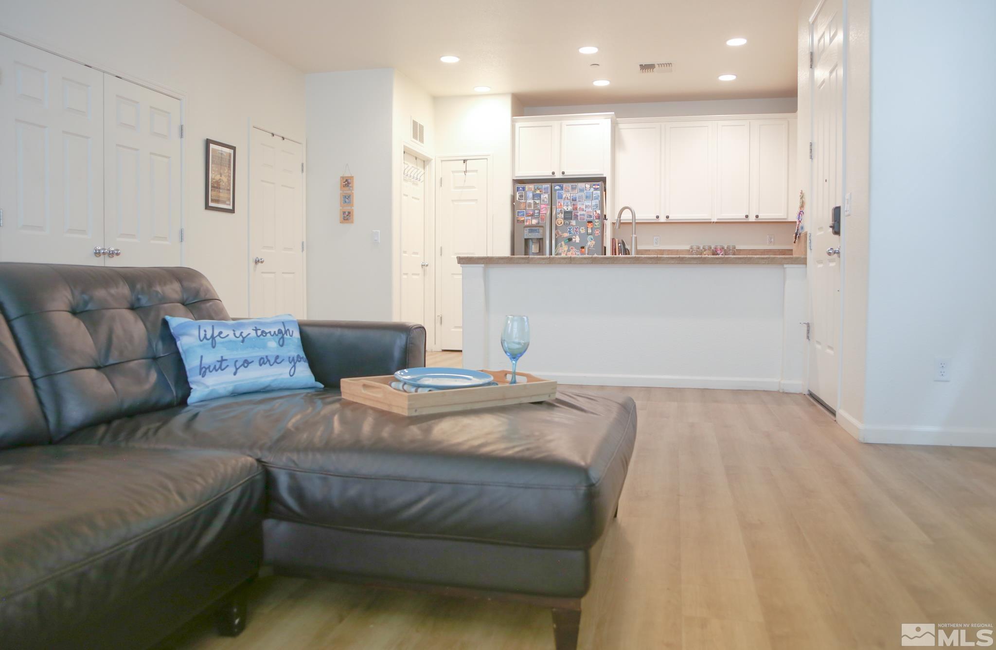1872 Wind Ranch Road, Unit A Reno, NV 89521 - Photo 9 of 33 a bed room with a bed and window