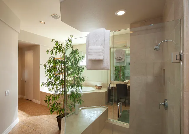 a bathroom with a bathtub and a sink
