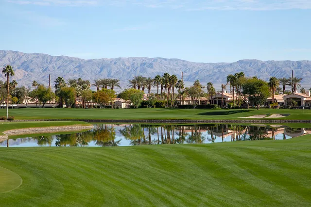 a view of a lake with a mountain in the background