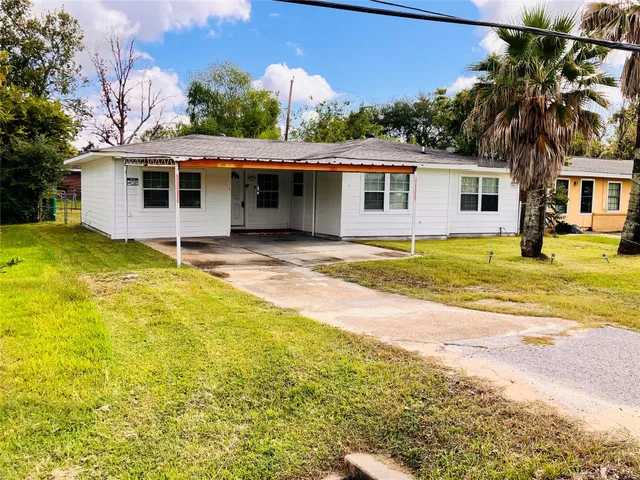 a view of a house with a swimming pool
