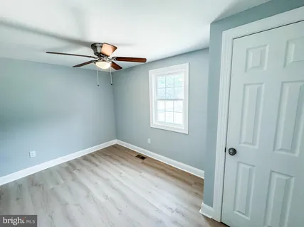 a bathroom with a sink a toilet and a bathtub