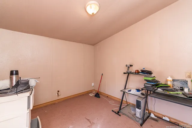 a kitchen with a stove and a sink