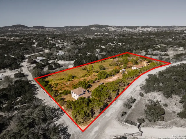 a view of a house with a big yard