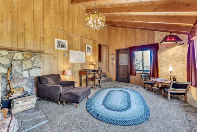 a room with furniture and a large window