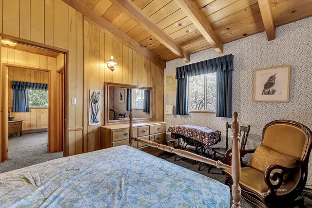 a bathroom with a sink a toilet and bathtub
