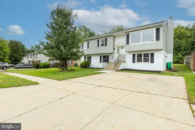 a front view of house with yard