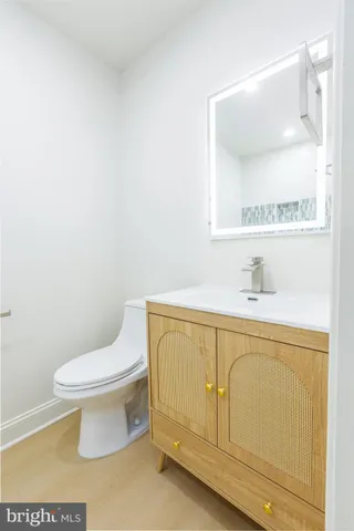 an arial view of a house with backyard