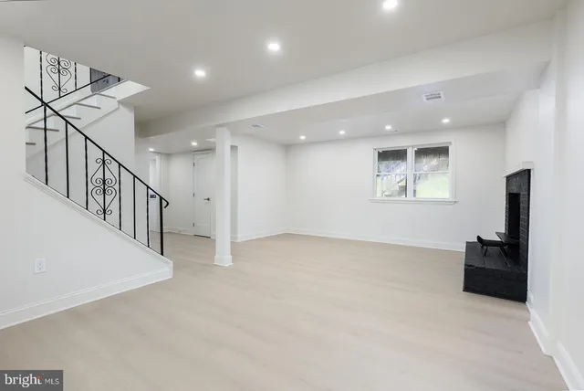 a view of house with yard and green space