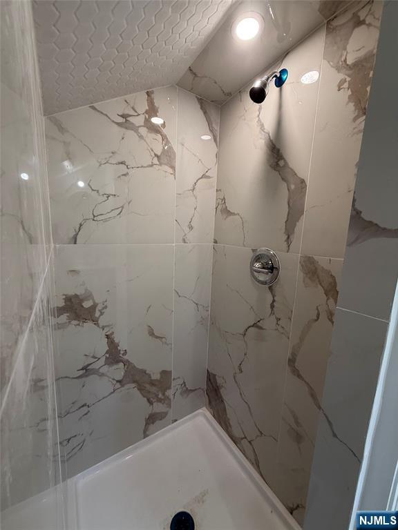 131 West Ramapo Avenue Mahwah, NJ 07430 - Photo 18 of 27 a bathroom with a bathtub and shower