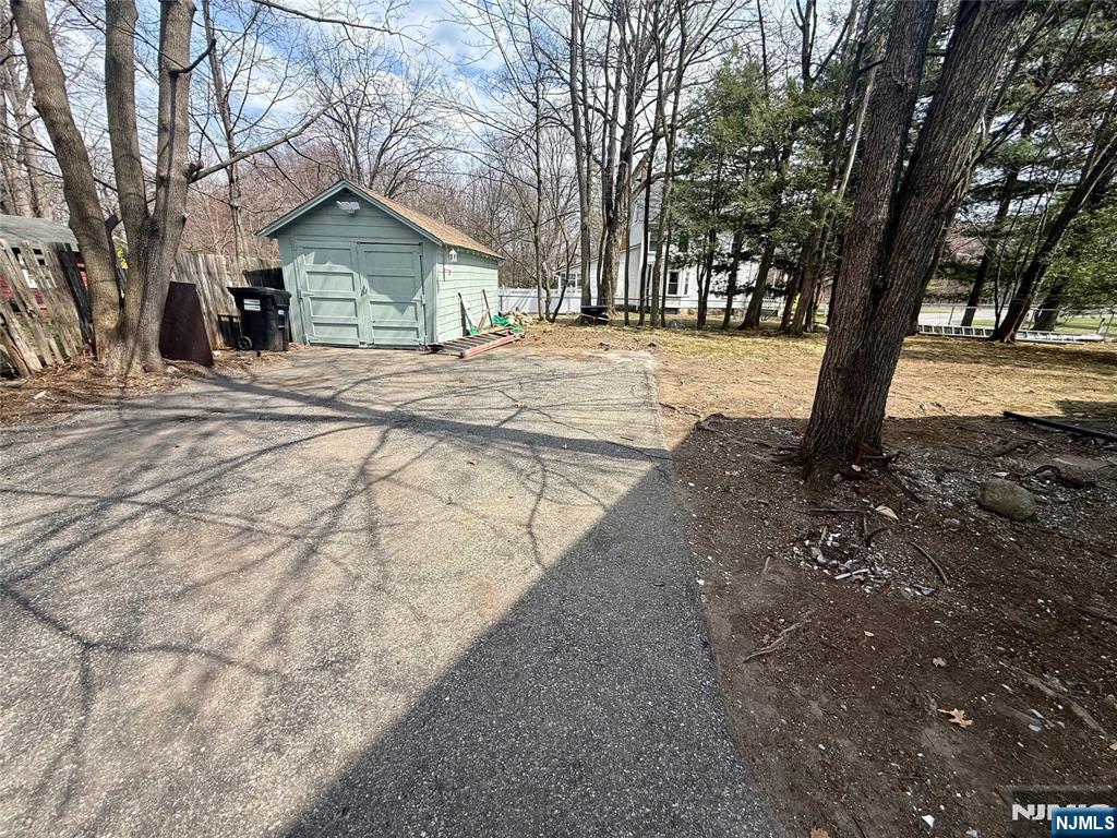 131 West Ramapo Avenue Mahwah, NJ 07430 - Photo 25 of 27 a front view of a house with a yard