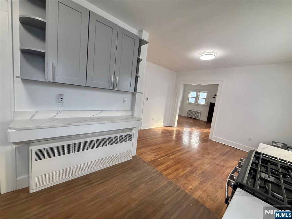131 West Ramapo Avenue Mahwah, NJ 07430 - Photo 3 of 27 a view of kitchen and hall with wooden floor