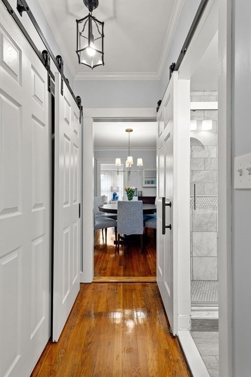 2 Charlotte Road Marblehead, MA 01945 - Photo 17 of 29 a view of a hallway with wooden floor and a bathroom