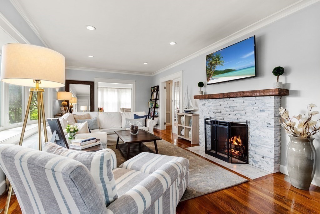 2 Charlotte Road Marblehead, MA 01945 - Photo 3 of 29 a living room with furniture and a fireplace