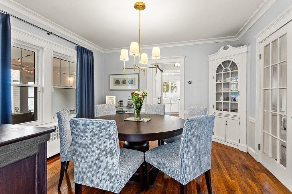 2 Charlotte Road Marblehead, MA 01945 - Photo 7 of 29 a dining room with furniture a chandelier and wooden floor