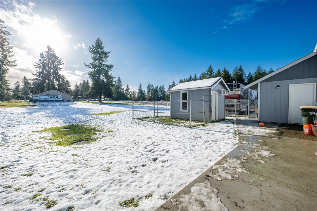 7514 191st Avenue Southwest Rochester, WA 98579 - Photo 36 of 39 a view of a house with a yard