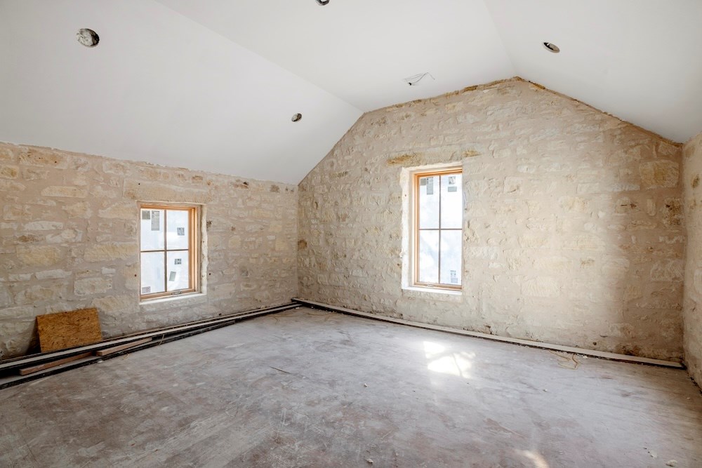 1410 Grapetown Road Fredericksburg, TX 78624 - Photo 11 of 60 an empty room with a window