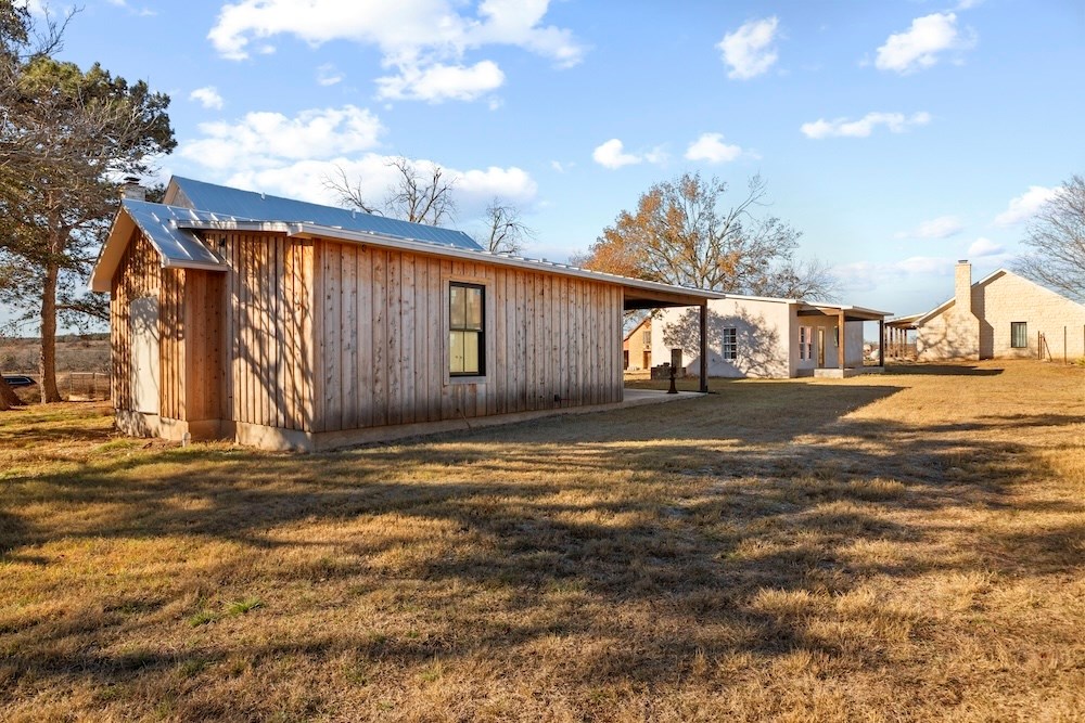 1410 Grapetown Road Fredericksburg, TX 78624 - Photo 14 of 60 a view of a street with houses