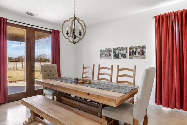 a bathroom with a sink a shower and mirror