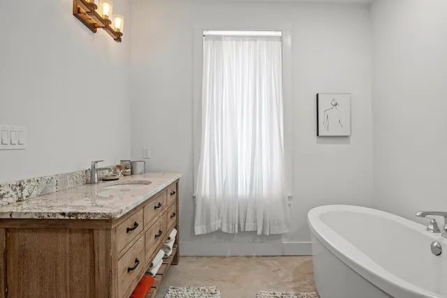 a view of swimming pool with outdoor seating