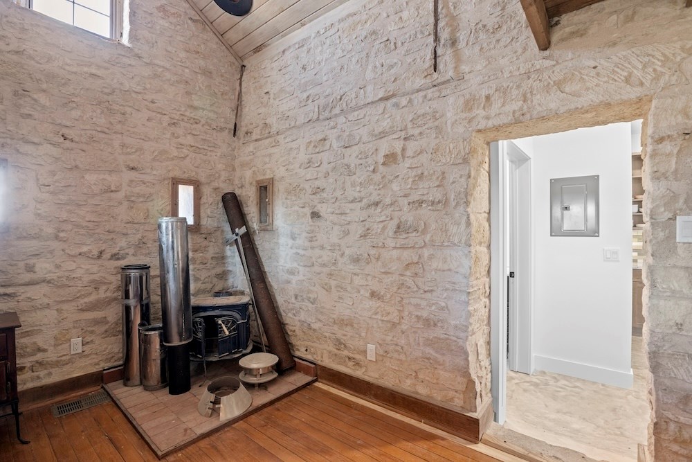 1410 Grapetown Road Fredericksburg, TX 78624 - Photo 38 of 60 a view of a door and chair