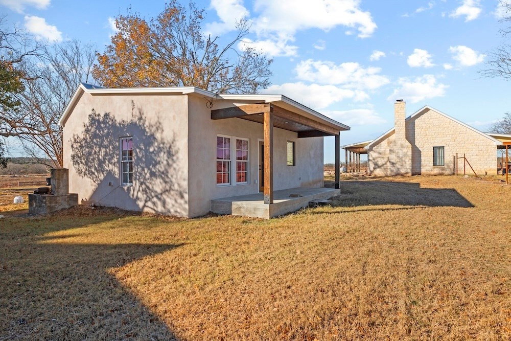 1410 Grapetown Road Fredericksburg, TX 78624 - Photo 47 of 60 a view of a house with a snow in the yard