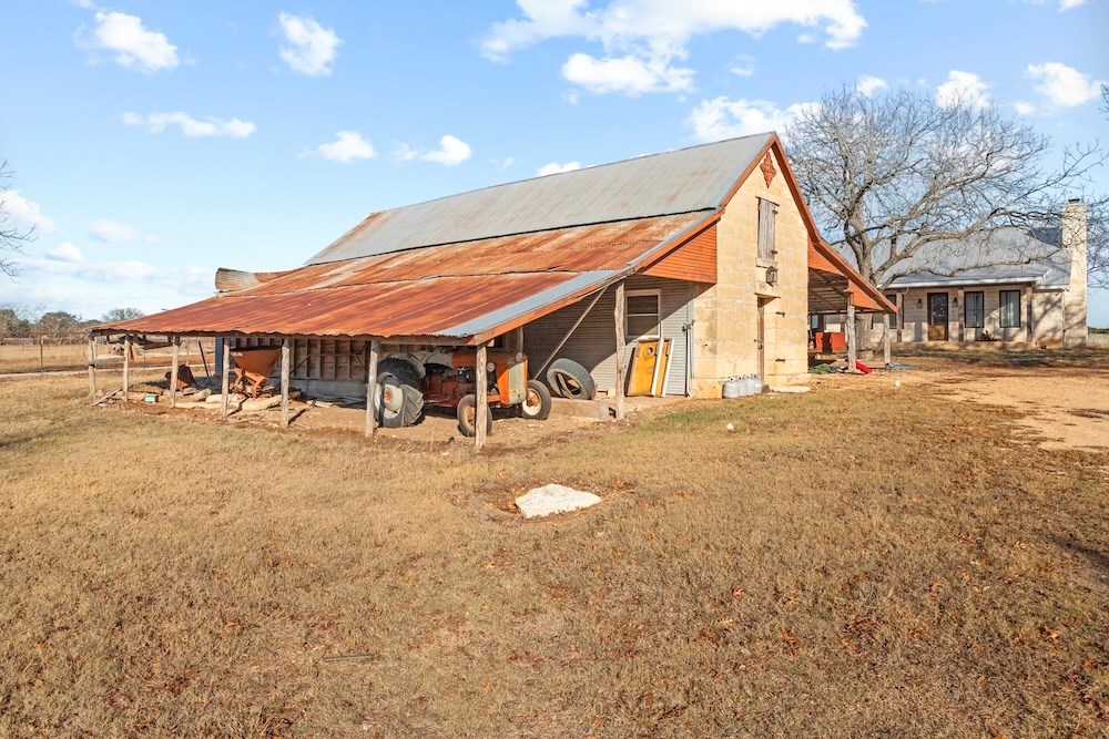 1410 Grapetown Road Fredericksburg, TX 78624 - Photo 48 of 60 a front view of a house with a yard