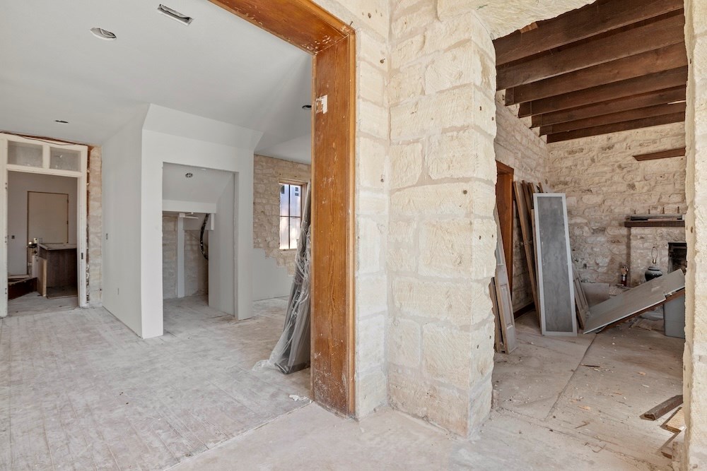 1410 Grapetown Road Fredericksburg, TX 78624 - Photo 5 of 60 a view of a hallway with closet and furniture