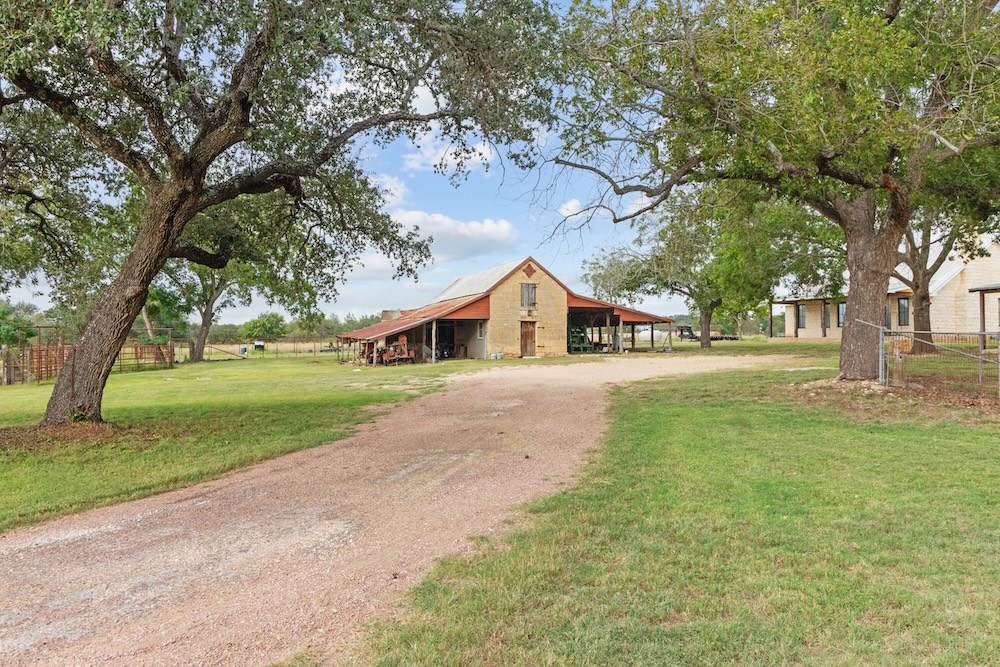 1410 Grapetown Road Fredericksburg, TX 78624 - Photo 57 of 60 a front view of house with yard and green space