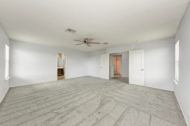a bathroom with a toilet a sink and bathtub