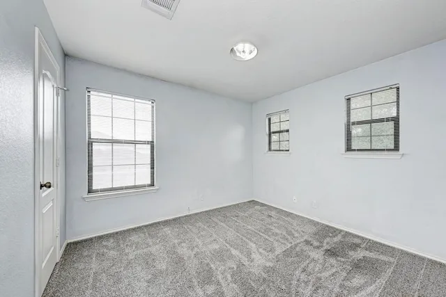 a view of a garden with a houses