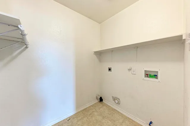 a garden with trees in front of it