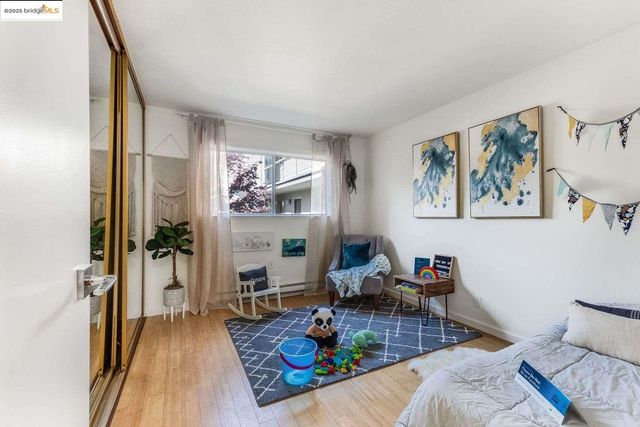 a floor to ceiling window and potted plant