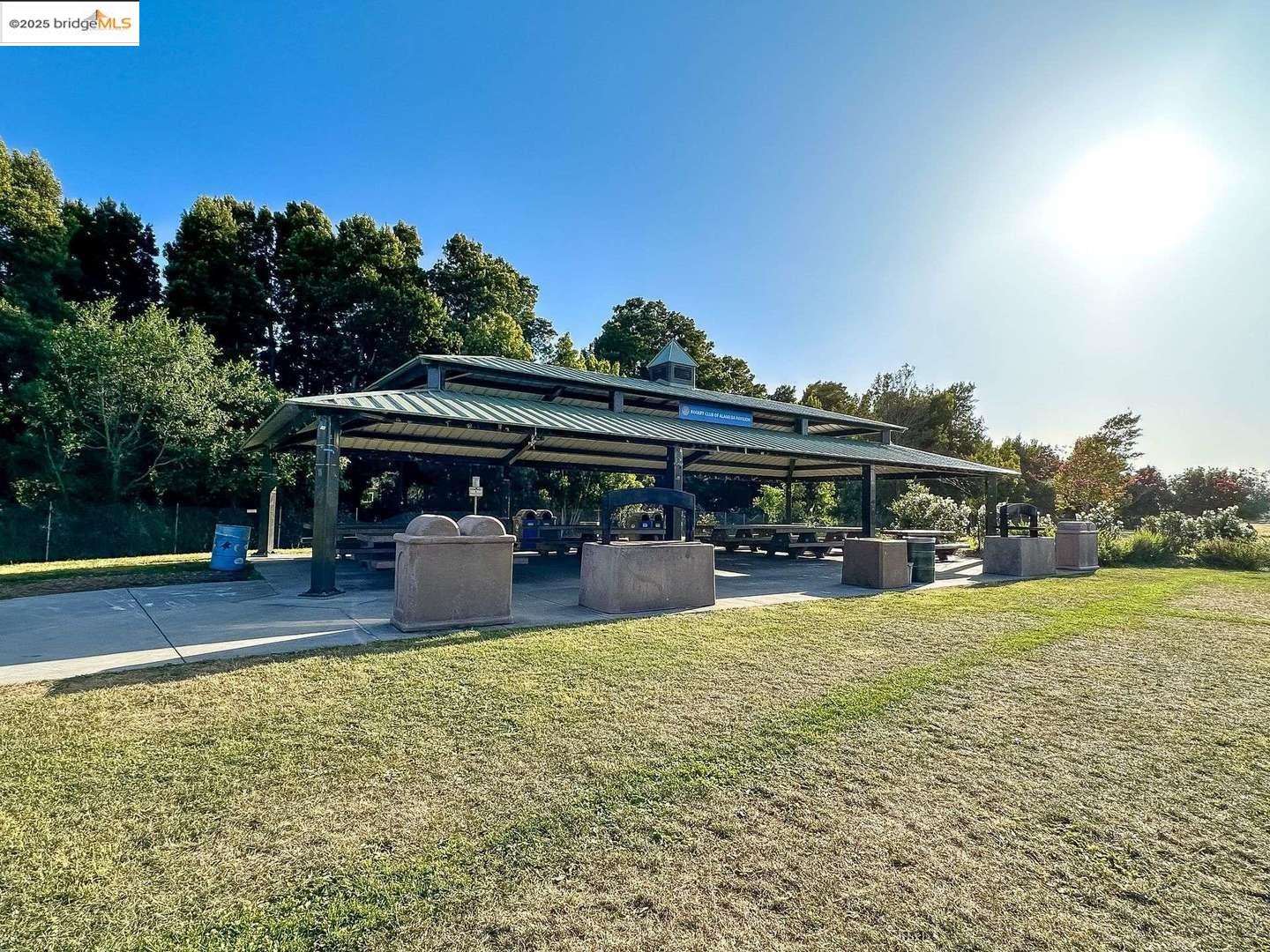 325 Kitty Hawk Road, Unit 207 Alameda, CA 94501 - Photo 31 of 43 a view of a house with pool yard and sitting area