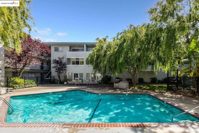 an empty room with a bench