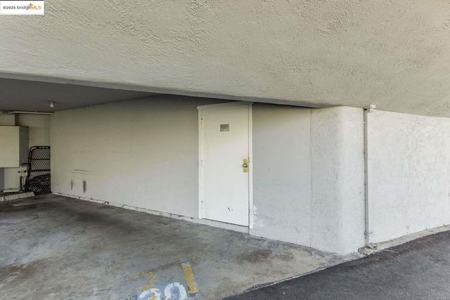 a view of a house with pool yard and sitting area